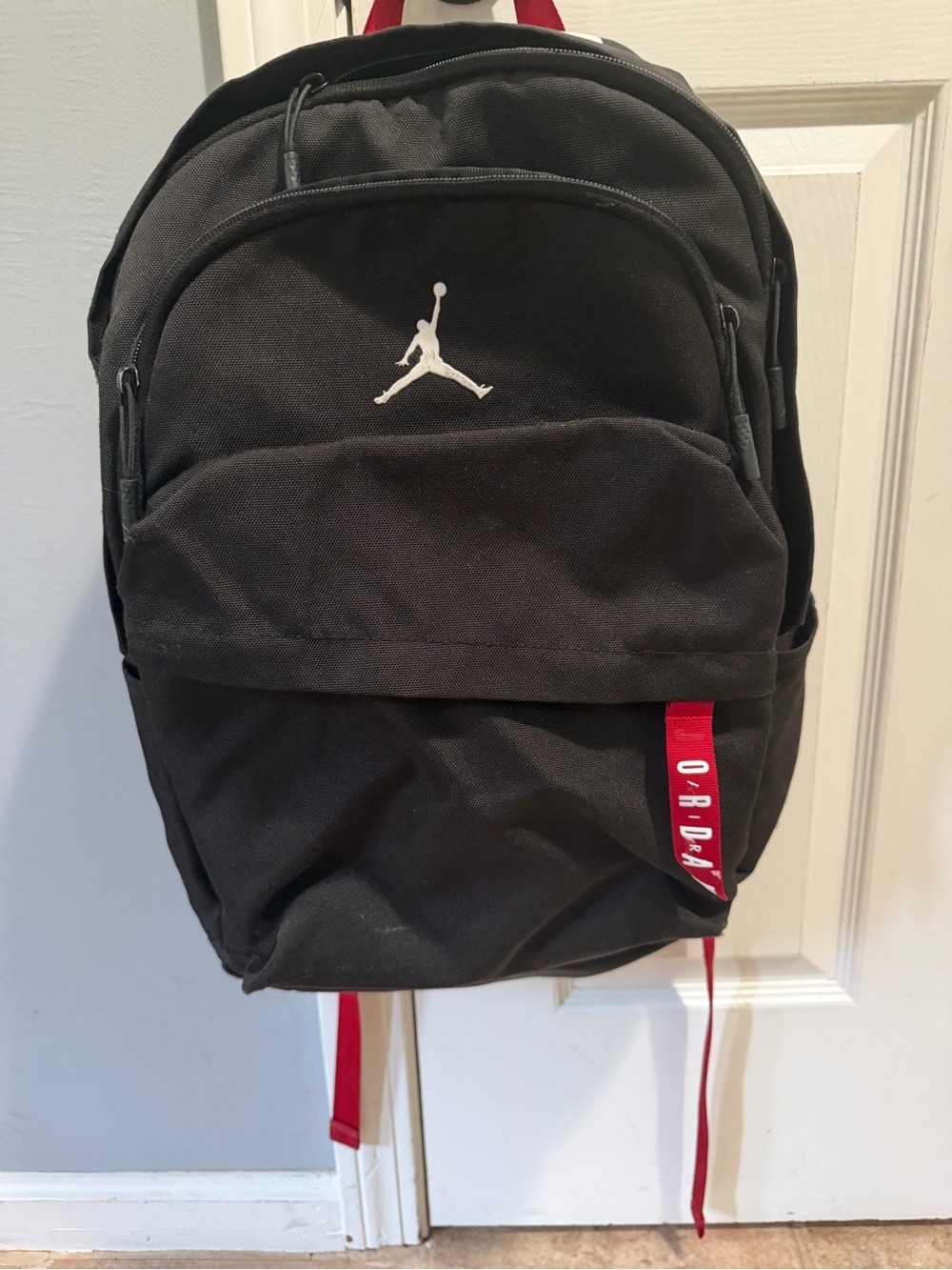 Jordan Black Backpack with White Jumpman and Red Accents